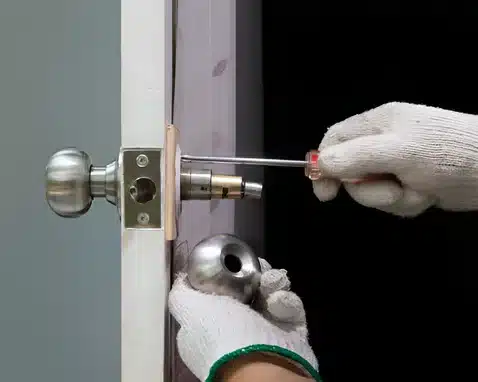 Repairing the lock of a wooden door 