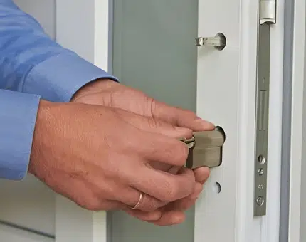 New lock installing in a wooden door
